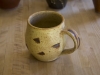 yellow salt and iron oxide mug