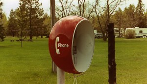 red bubble-shaped phone booth