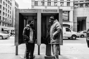 black and white phone booths.  hell's kitchen, ny