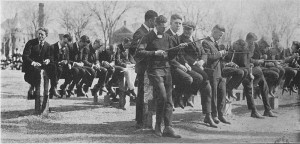 public domain image_black and white picture of throngs of Dartmouth students sitting on a fence