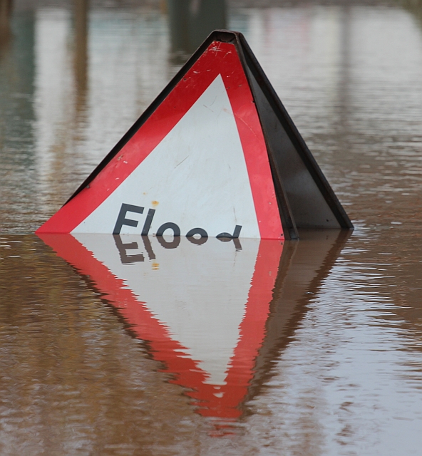 flood sign in water